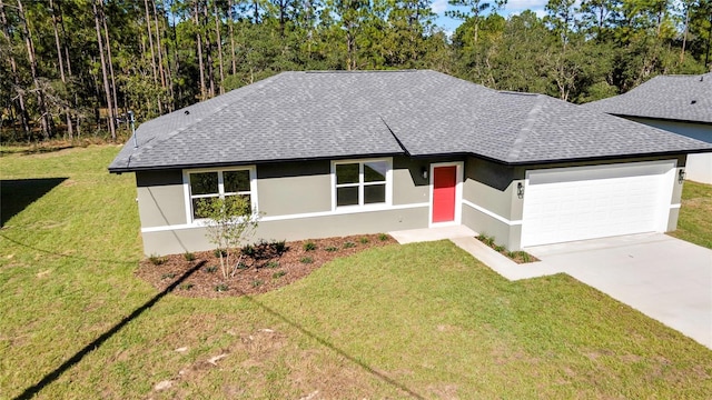 single story home with a front yard and a garage