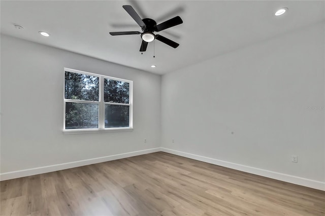 8118 N Santos Dr, Citrus Springs, FL 34434 - empty room with baseboards, light wood finished floors, recessed lighting, and ceiling fan