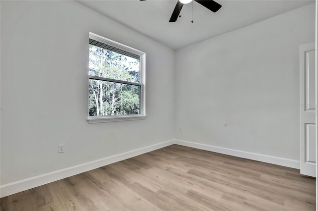 empty room with light hardwood / wood-style flooring and ceiling fan