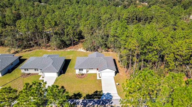8118 N Santos Dr, Citrus Springs, FL 34434 - view of subject property featuring a heavily wooded area