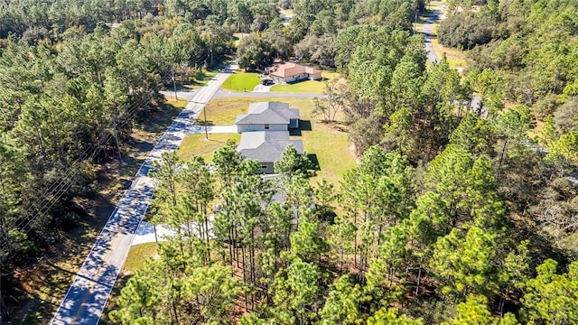 8118 N Santos Dr, Citrus Springs, FL 34434 - drone / aerial view of a heavily wooded area