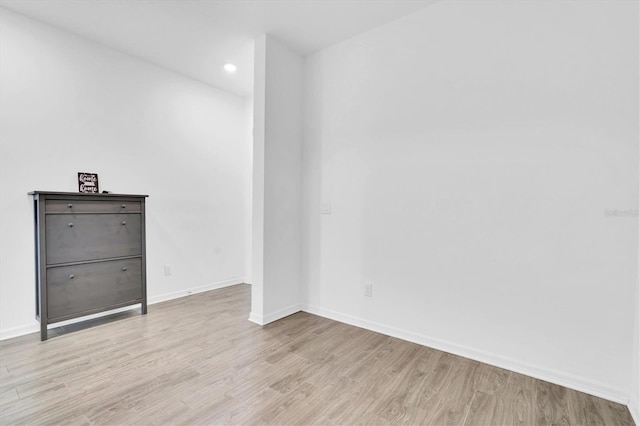 empty room with light wood-type flooring