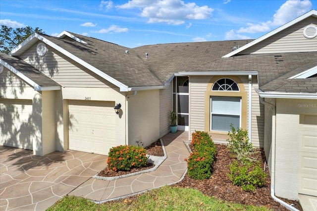 property entrance featuring a garage