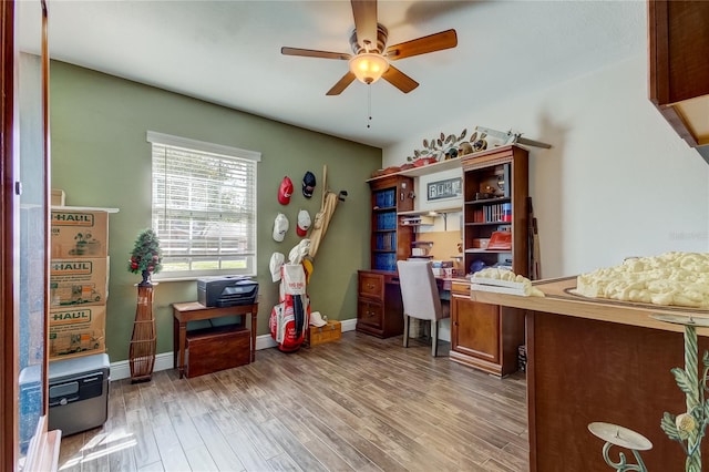 office area featuring wood-type flooring and ceiling fan