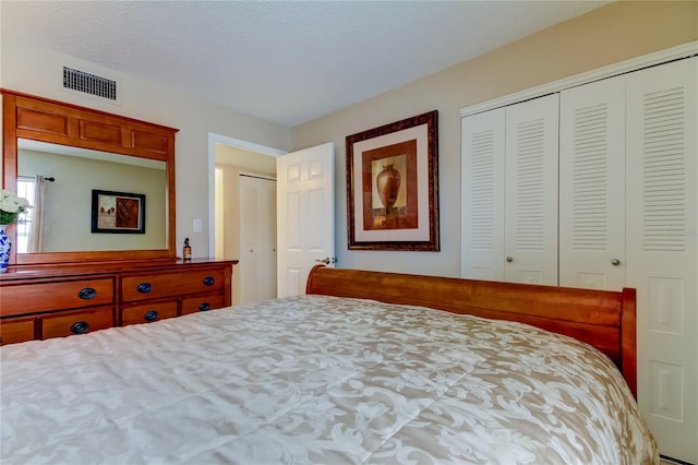 bedroom with a textured ceiling