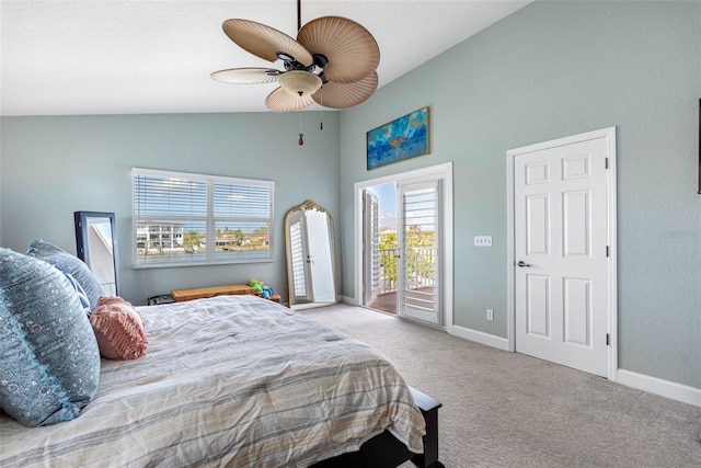 carpeted bedroom featuring vaulted ceiling, access to exterior, and ceiling fan