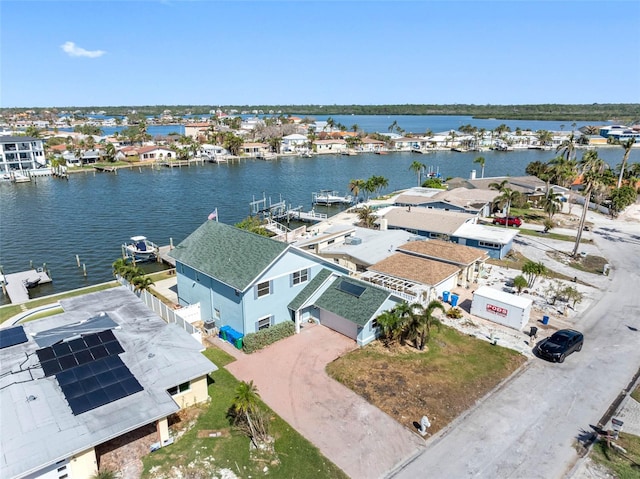 drone / aerial view with a water view