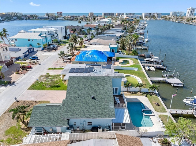 bird's eye view with a water view