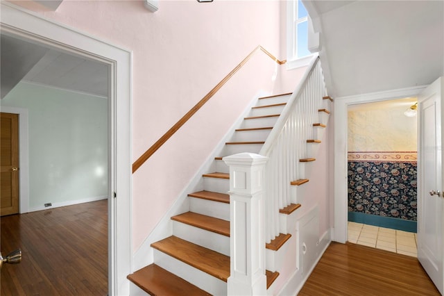 stairway with wood-type flooring