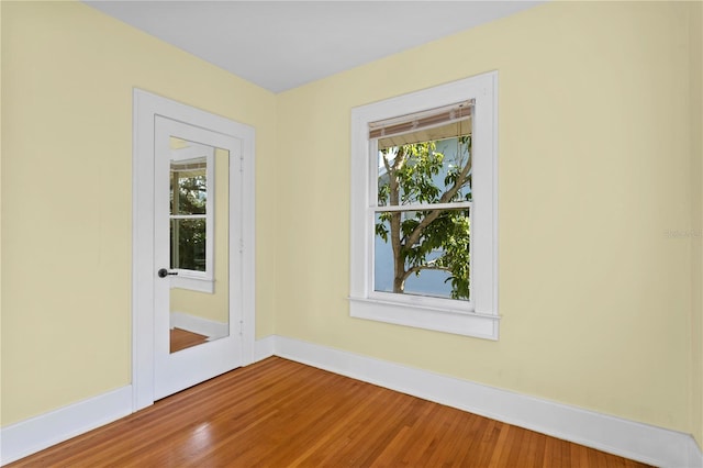 empty room featuring hardwood / wood-style flooring