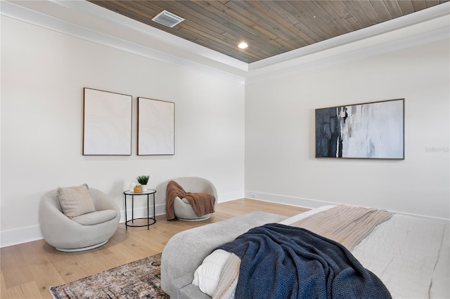 interior space featuring hardwood / wood-style flooring, wood ceiling, and a tray ceiling