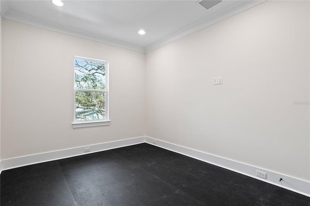 unfurnished room featuring ornamental molding