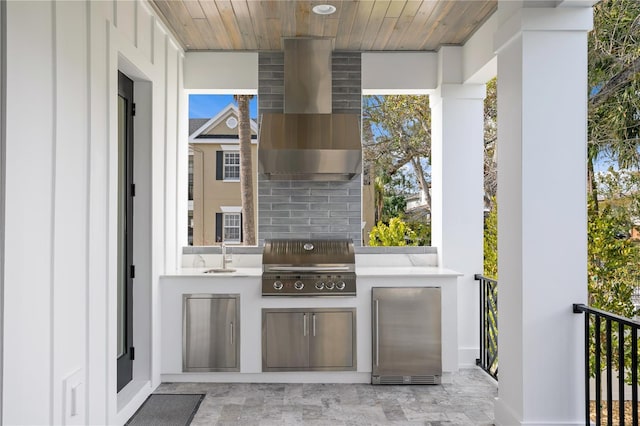 view of patio featuring area for grilling, sink, and grilling area