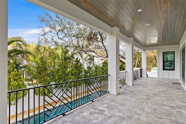 view of patio with a balcony