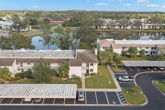 bird's eye view with a water view