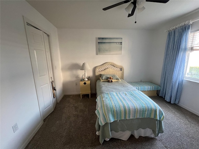 carpeted bedroom with a closet and ceiling fan