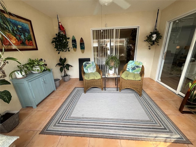 interior space featuring ceiling fan