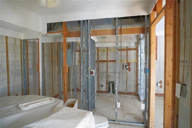 bathroom featuring a textured ceiling