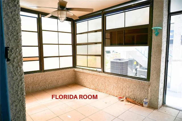 179 Medallion Blvd Unit C, Madeira Beach, FL 33708 - unfurnished sunroom with healthy amount of natural light