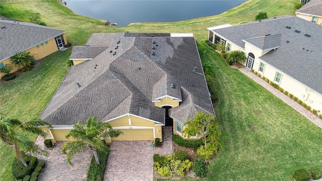 drone / aerial view featuring a water view