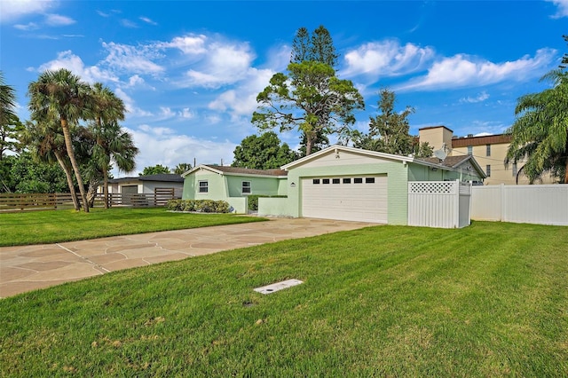 3887 50th Ave S, Saint Petersburg, FL 33711 - view of front facade with driveway and a garage