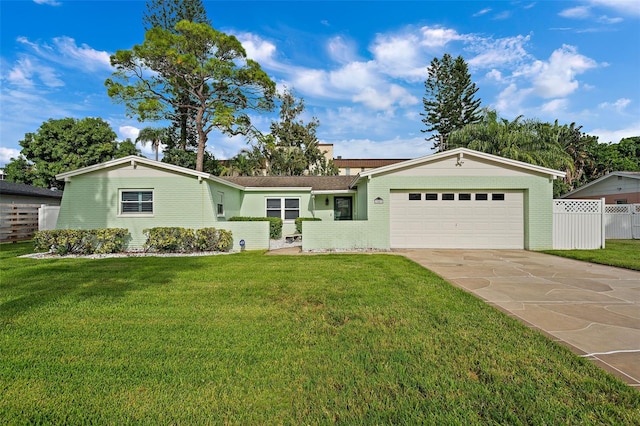 ranch-style house with a front yard and a garage