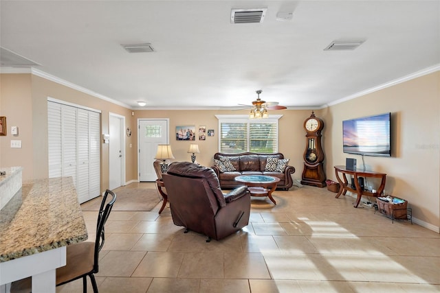 3887 50th Ave S, Saint Petersburg, FL 33711 - living area with ornamental molding, ceiling fan, light tile patterned floors, and baseboards
