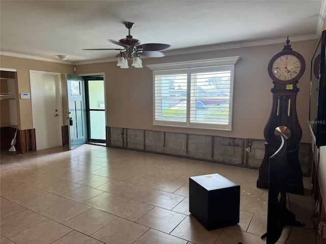 3887 50th Ave S, Saint Petersburg, FL 33711 - living room with crown molding, a ceiling fan, plenty of natural light, and light tile patterned floors