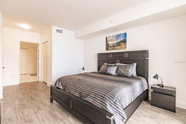 bedroom featuring light hardwood / wood-style floors