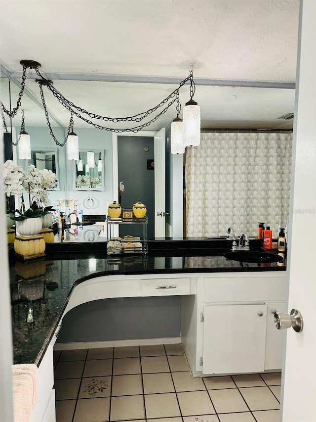 bathroom featuring vanity and tile patterned floors