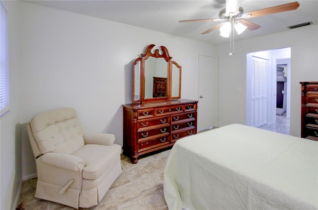 bedroom featuring a closet and ceiling fan