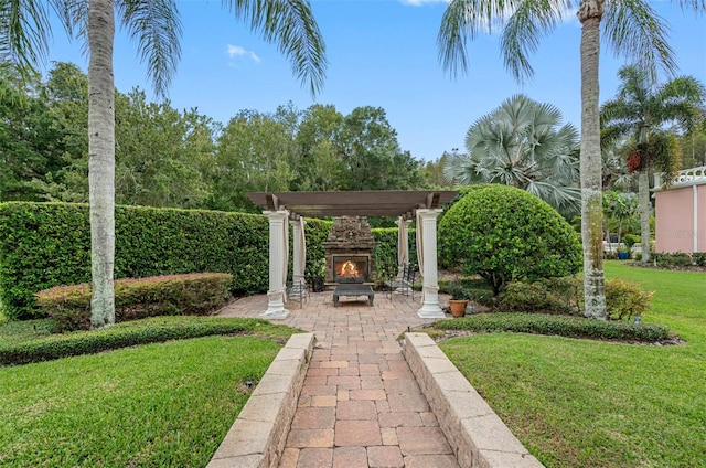 view of yard featuring a patio area and a pergola