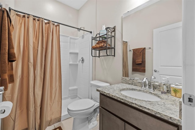 bathroom with vanity, toilet, a shower with curtain, and tile patterned flooring