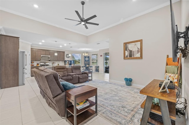 living room featuring crown molding, light tile patterned flooring, and ceiling fan with notable chandelier