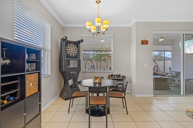 tiled dining space featuring ornamental molding and ceiling fan with notable chandelier