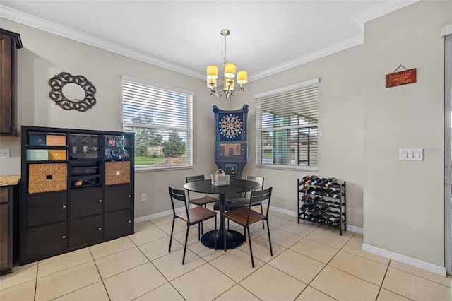 dining area with ornamental molding, a chandelier, and light tile patterned floors