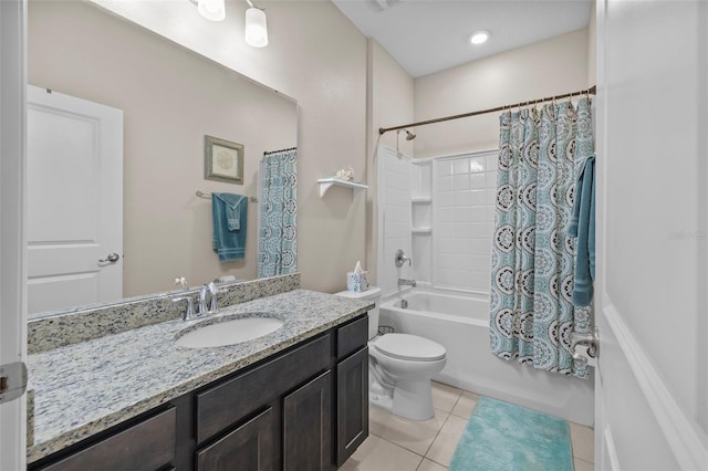 full bathroom with shower / bath combo with shower curtain, toilet, vanity, and tile patterned floors