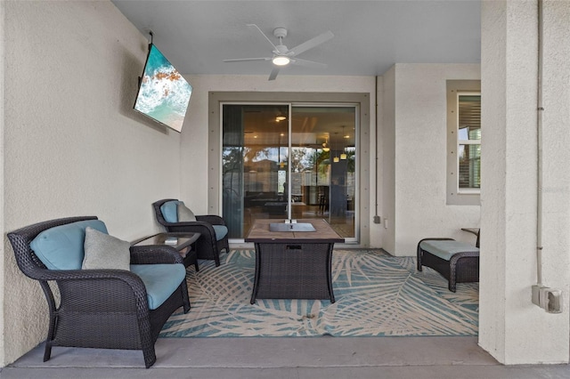 view of patio / terrace featuring an outdoor living space and ceiling fan