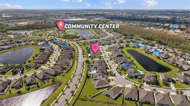 birds eye view of property featuring a water view