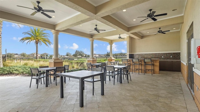 view of patio / terrace featuring ceiling fan