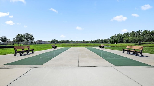 view of home's community featuring a lawn