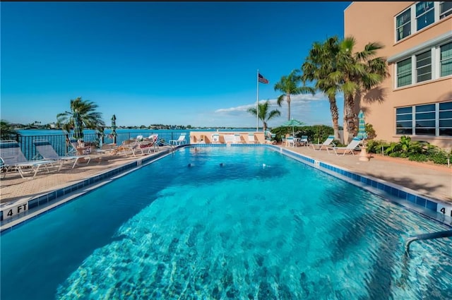 7625 Sun Island Dr S Unit 101, South Pasadena, FL 33707 - community pool featuring a patio