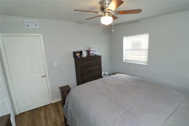 bedroom featuring ceiling fan and light hardwood / wood-style flooring