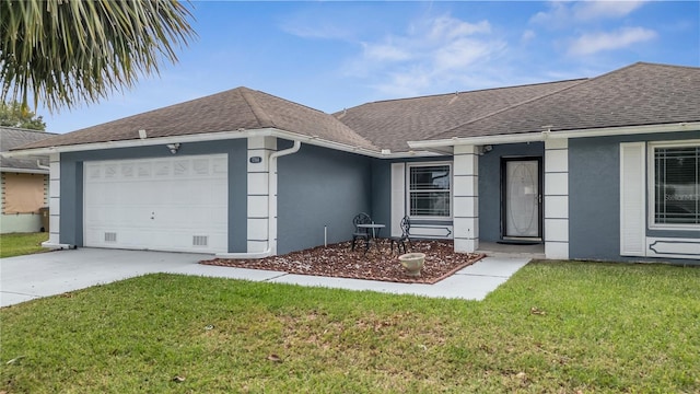 ranch-style home featuring a front lawn and a garage