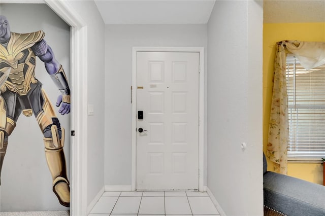 mudroom with light tile patterned floors