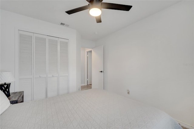 bedroom featuring a closet and ceiling fan