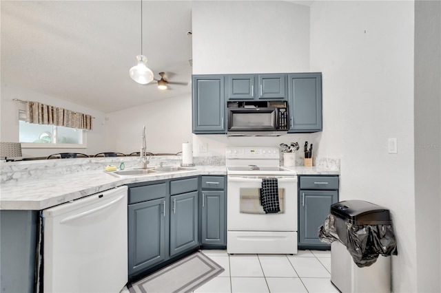 kitchen featuring lofted ceiling, ceiling fan, pendant lighting, sink, and white appliances