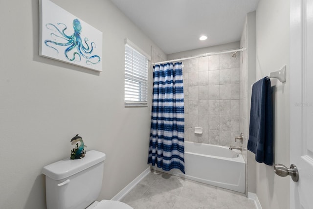 bathroom with toilet, shower / tub combo, and tile patterned flooring