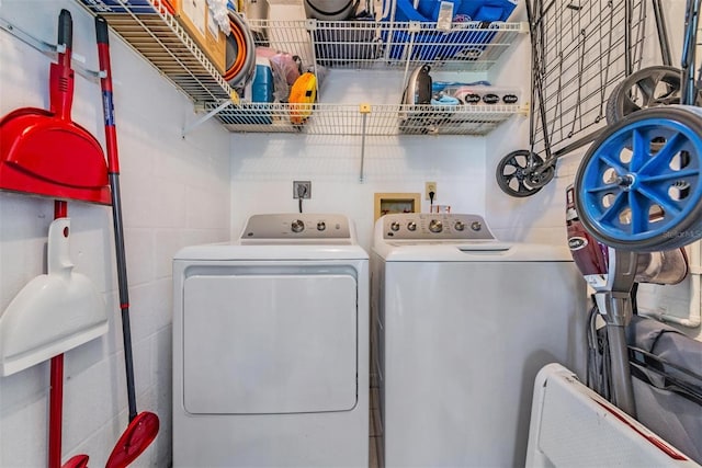 laundry room featuring separate washer and dryer