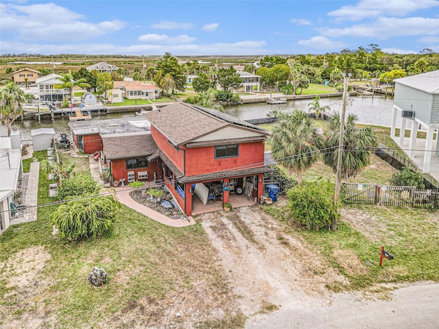 drone / aerial view with a water view